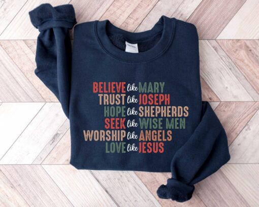 christian christmas sweatshirt with believe design for faithful expression and celebrating jesus during the holiday season eyckc scaled