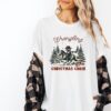 funny christmas shirt vintage cowboy raccoon tee with humorous design for holiday celebrations and unique style 1ojpe