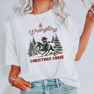 funny christmas shirt vintage cowboy raccoon tee with humorous design for holiday celebrations and unique style cpusm