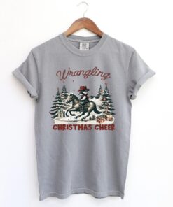 funny christmas shirt vintage cowboy raccoon tee with humorous design for holiday celebrations and unique style cys0r scaled