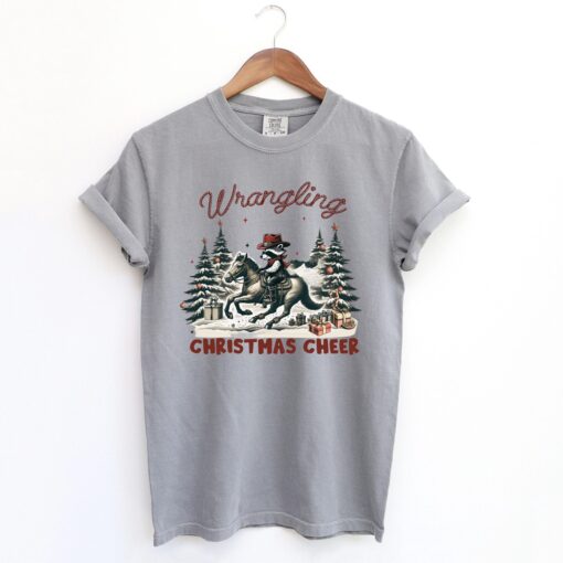 funny christmas shirt vintage cowboy raccoon tee with humorous design for holiday celebrations and unique style cys0r scaled