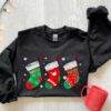 funny christmas shirt for women vintage style sweatshirt with unique sock design ideal for holiday outfits and celebrations 1uywq scaled