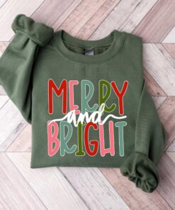 funny christmas shirt merry and bright sweatshirt with believe design for holiday celebrations and festive gatherings b4jcp scaled