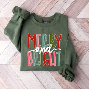 funny christmas shirt merry and bright sweatshirt with believe design for holiday celebrations and festive gatherings b4jcp scaled