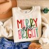 funny christmas shirt merry and bright sweatshirt with believe design for holiday celebrations and festive gatherings uqdyh