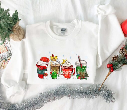 funny christmas sweatshirt for coffee lovers featuring winter snowman design and latte graphics ilduc scaled