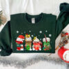 funny christmas sweatshirt for coffee lovers featuring winter snowman design and latte graphics kwrue scaled