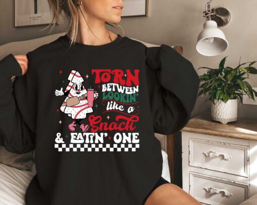 funny christmas sweatshirt torn between looking like a snack or eating one comfortable gym workout apparel for sarcastic humor umdmv