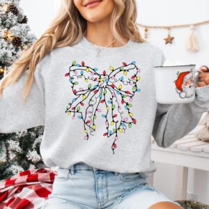 funny christmas sweatshirt with coquette bow design for holiday celebrations and new year events comfortable light sweater for festive wear hlvx2