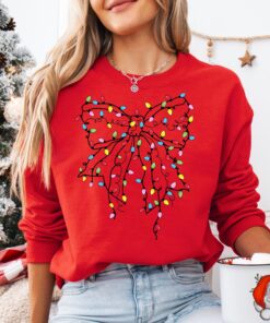 funny christmas sweatshirt with coquette bow design for holiday celebrations and new year events comfortable light sweater for festive wear qesev scaled