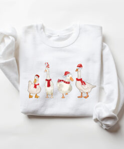 funny christmas sweatshirt with duck design for holiday celebrations and winter comfort unique duckmas shirt for festive wear dcnza scaled