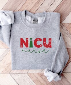 nicu nurse christmas sweatshirt with fun design for holiday spirit and comfort colors ideal for nicu nurses celebrating the season fwxwb