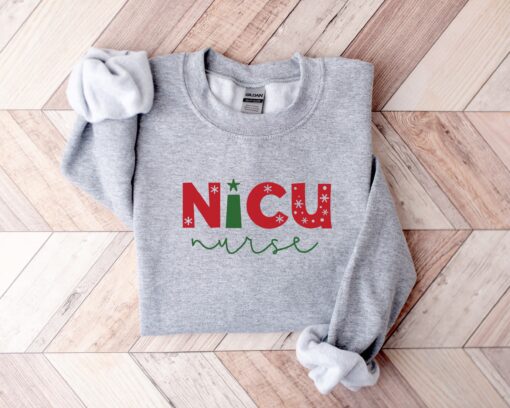 nicu nurse christmas sweatshirt with fun design for holiday spirit and comfort colors ideal for nicu nurses celebrating the season