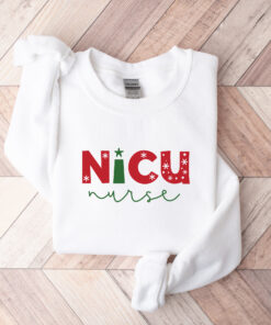 nicu nurse christmas sweatshirt with fun design for holiday spirit and comfort colors ideal for nicu nurses celebrating the season wokju