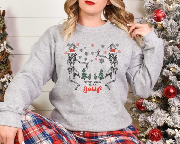 skeleton dance sweatshirt for christmas featuring jolly skeleton design and skull graphics in fun holiday colors jwuzf scaled