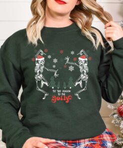 skeleton dance sweatshirt for christmas featuring jolly skeleton design and skull graphics in fun holiday colors tjpot scaled