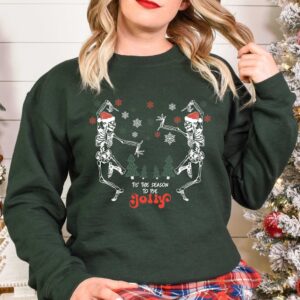 skeleton dance sweatshirt for christmas featuring jolly skeleton design and skull graphics in fun holiday colors tjpot scaled