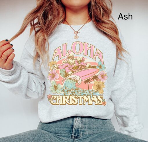 vintage aloha christmas sweatshirt featuring surfing santa design for hawaiian holiday celebrations and funny xmas party events