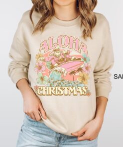 vintage aloha christmas sweatshirt featuring surfing santa design for hawaiian holiday celebrations and funny xmas party events fnwtx