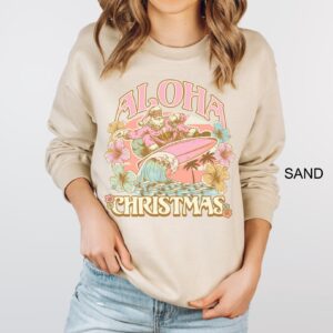 vintage aloha christmas sweatshirt featuring surfing santa design for hawaiian holiday celebrations and funny xmas party events fnwtx