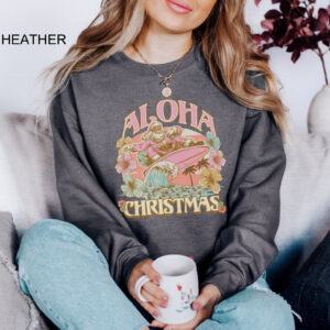 vintage aloha christmas sweatshirt featuring surfing santa design for hawaiian holiday celebrations and funny xmas party events pnvml