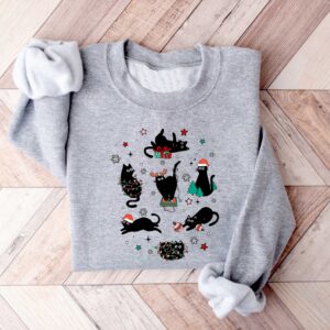 vintage black cat christmas sweatshirt for cat lovers featuring a fun holiday design ideal for xmas celebrations and cozy winter wear gyebl scaled