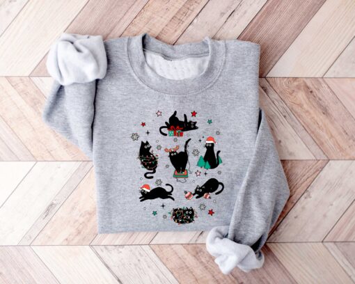 vintage black cat christmas sweatshirt for cat lovers featuring a fun holiday design ideal for xmas celebrations and cozy winter wear gyebl scaled