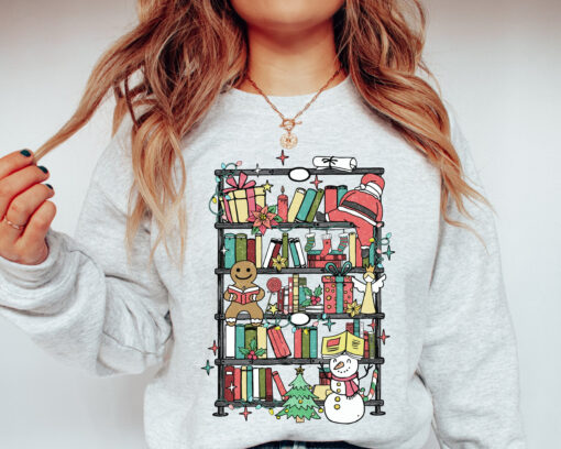 vintage bookish christmas sweatshirt for reading lovers with bookshelf santa design in soft comfortable fabric jmr8l