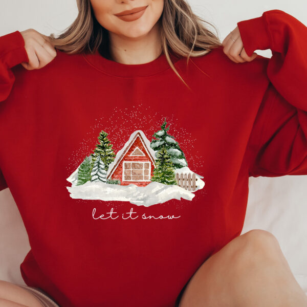 vintage christmas cabin sweatshirt with let it snow design for winter comfort and holiday style bynin scaled