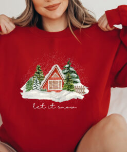 vintage christmas cabin sweatshirt with let it snow design for winter comfort and holiday style bynin scaled