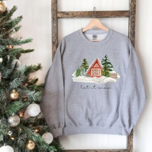 vintage christmas cabin sweatshirt with let it snow design for winter comfort and holiday style pthiw