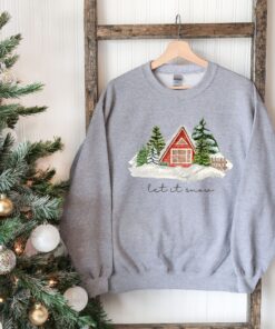 vintage christmas cabin sweatshirt with let it snow design for winter comfort and holiday style pthiw scaled