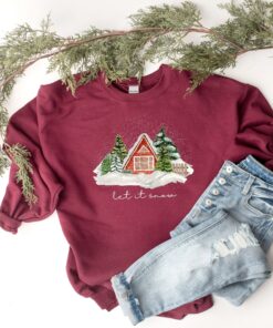 vintage christmas cabin sweatshirt with let it snow design for winter comfort and holiday style uria6 scaled