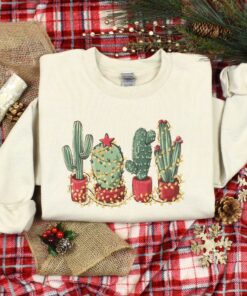 vintage christmas cactus t shirt for plant lovers featuring cowboy design and southern style holiday theme dep2d scaled