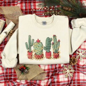 vintage christmas cactus t shirt for plant lovers featuring cowboy design and southern style holiday theme dep2d scaled