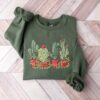 vintage christmas cactus t shirt for plant lovers featuring cowboy design and southern style holiday theme fqwke scaled