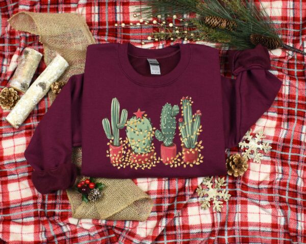 vintage christmas cactus t shirt for plant lovers featuring cowboy design and southern style holiday theme tpofz scaled