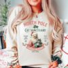 vintage christmas cat sweatshirt featuring santa cat design for cat moms with retro style and unique holiday charm weggu