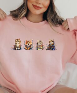 vintage christmas cat sweatshirt for cat lovers featuring meowy christmas design comfortable crewneck style dmpnb scaled