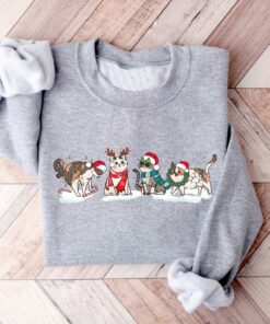 vintage christmas cat sweatshirt for cat lovers featuring various cat breeds and kittens ideal for holiday celebrations sjiev scaled