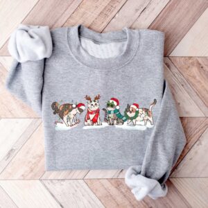 vintage christmas cat sweatshirt for cat lovers featuring various cat breeds and kittens ideal for holiday celebrations sjiev scaled