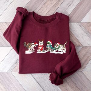 vintage christmas cat sweatshirt for cat lovers featuring various cat breeds and kittens ideal for holiday celebrations xbdqa scaled