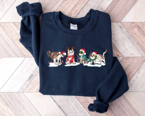 vintage christmas cat sweatshirt for cat lovers featuring various cat breeds and kittens ideal for holiday celebrations ybsis scaled