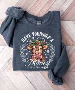 vintage christmas cow sweatshirt for women featuring cute farm design in soft fabric ideal for holiday gatherings and seasonal wear eygni