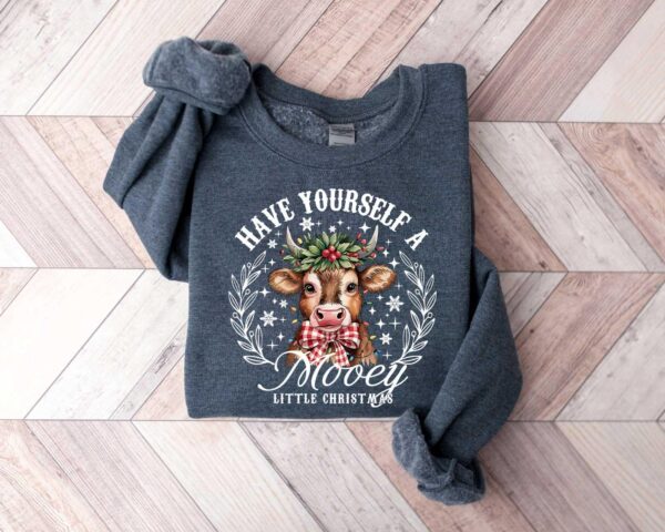 vintage christmas cow sweatshirt for women featuring cute farm design in soft fabric ideal for holiday gatherings and seasonal wear eygni