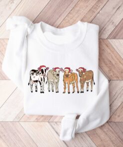 vintage christmas cow sweatshirt for women with highland cow design and festive lights crewneck style rcjnb scaled