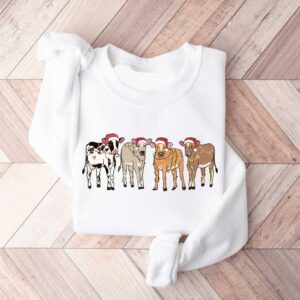 vintage christmas cow sweatshirt for women with highland cow design and festive lights crewneck style rcjnb scaled