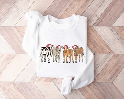 vintage christmas cow sweatshirt for women with highland cow design and festive lights crewneck style rcjnb scaled