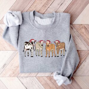 vintage christmas cow sweatshirt for women with highland cow design and festive lights crewneck style sxpts scaled