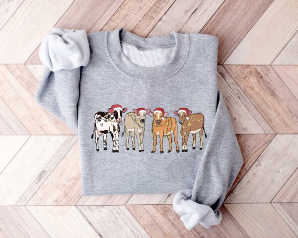 vintage christmas cow sweatshirt for women with highland cow design and festive lights crewneck style sxpts scaled